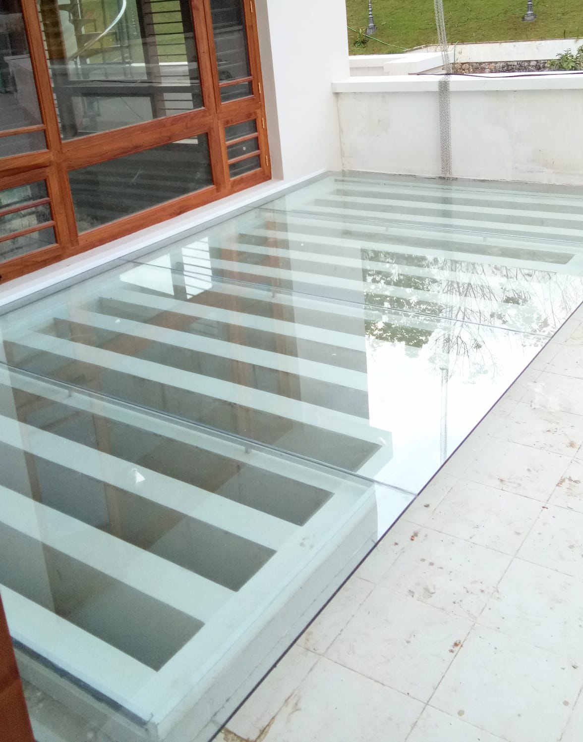 glass pergola designers in Kerala