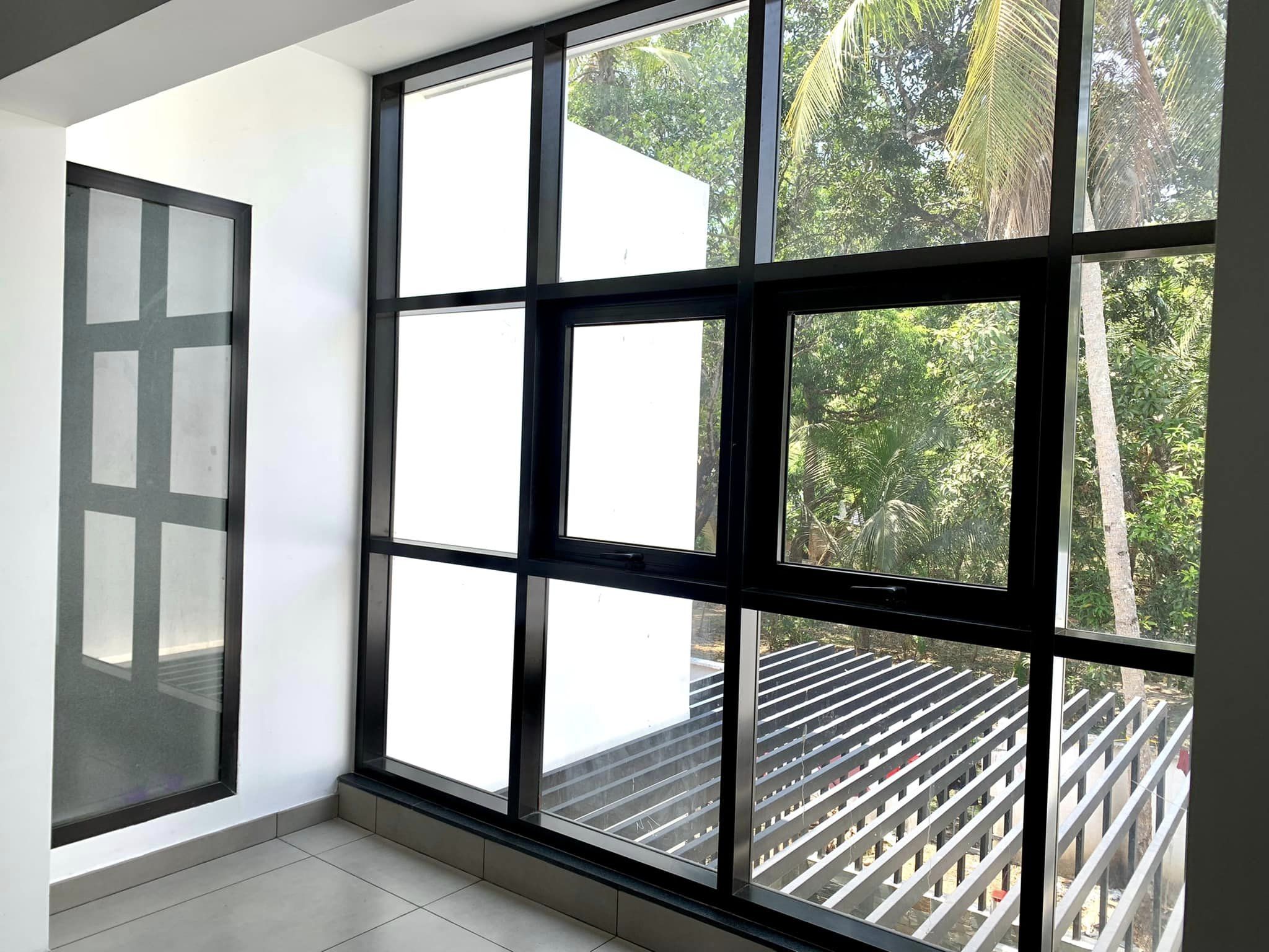 Aluminium heavy duty windows & doors works at mr. Hamsath nhamanghat residence