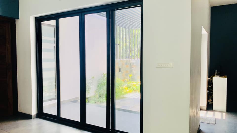 Aluminium heavy duty windows & doors works at mr. Hamsath nhamanghat residence