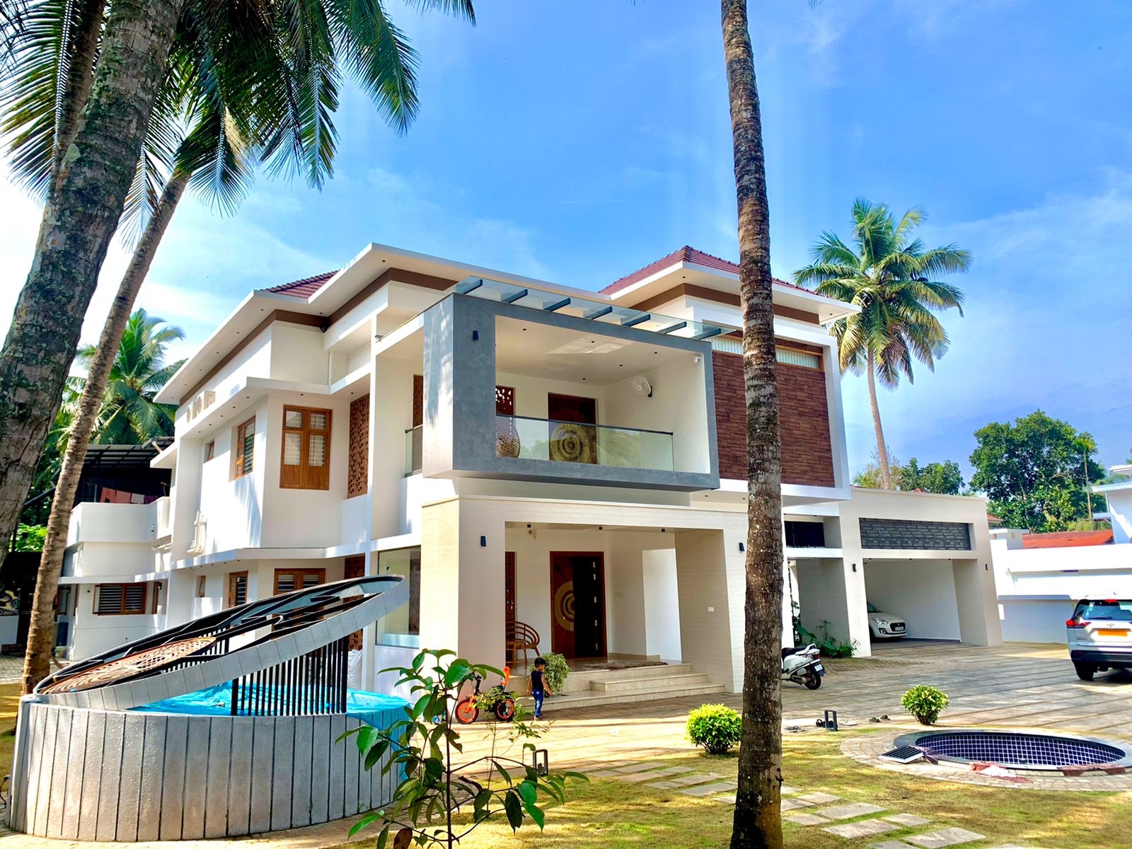 Luxury villa glass work completion images dr. Akbar ali, panthavoor	