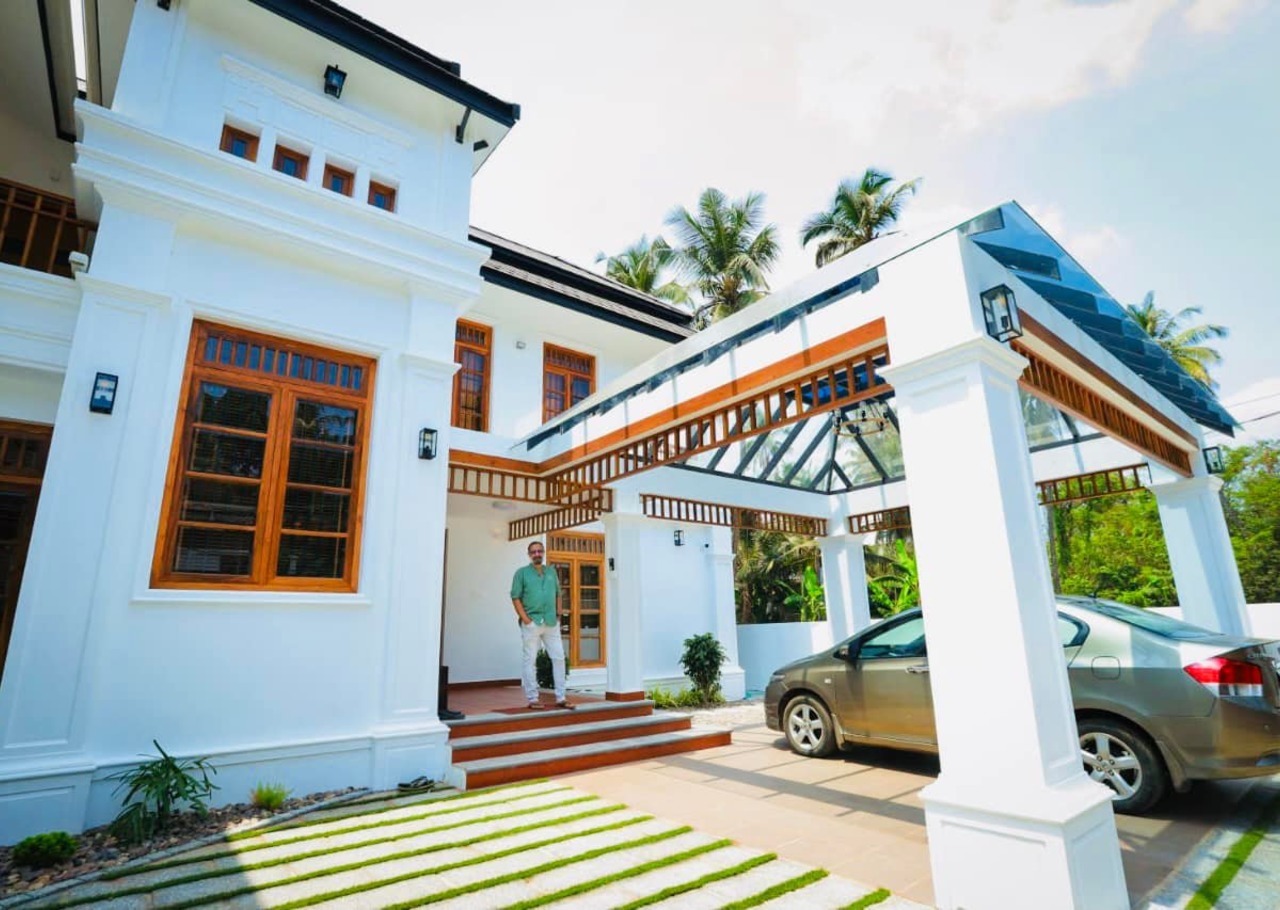 Mr Ouseppachan Residence - Featured Image 1