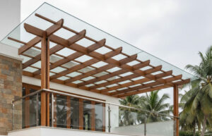Experience Modern Outdoor Elegance with Glass Pergola Works by Green Interio Fusion