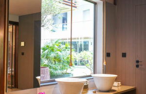 Upgrade Your Bathroom with Luxury Glass Shower Partitions from Green Interio Fusion