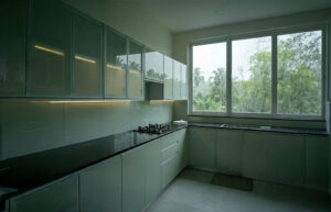 Easy to Clean and Moisture-Proof: Why Glass Modular Kitchen Works Are Best for Kerala Weather 